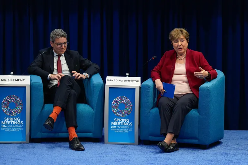 Sven Clement moderating a town hall with IMF Managing Director Kristalina Georgieva