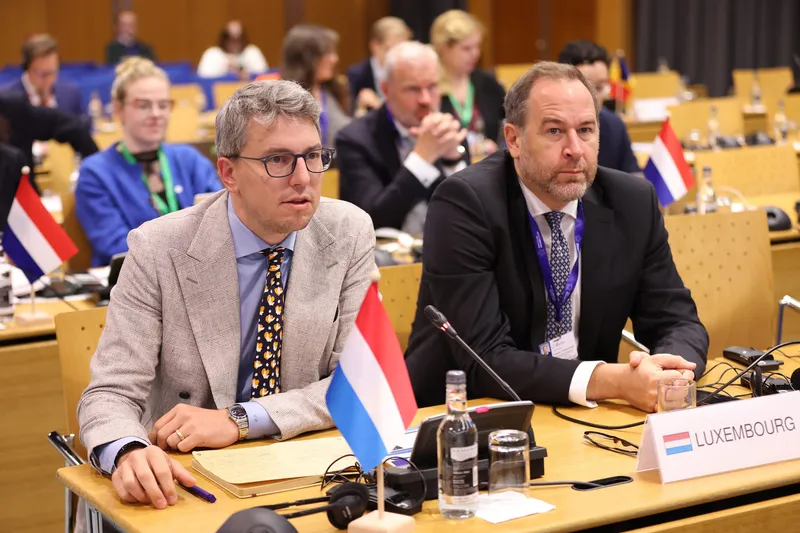 Sven Clement at the Luxembourg delegation desk during an interparliamentary conference in Dublin Castle